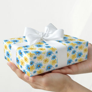 Papel de regalo floral azul y amarillo brillante