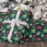 Papel De Regalo Flores de Poinsettia Navidad<br><div class="desc">Un papel de regalo festivo y elegante que presenta un colorido patrón de acuarela de flores de poinsettia rojas y verdes sobre un fondo verde oscuro, casi negro. Este diseño es perfecto para agregar un toque vibrante y alegre a tus regalos de Navidad. El patrón muestra poinsettias bellamente pintadas, capturando...</div>