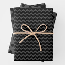 Papel de regalo gris y negro con múltiples patrone