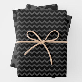Papel de regalo gris y negro con múltiples patrone