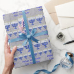 Papel De Regalo Hanukkah Dark Blue Menorah Silver Personalizado<br><div class="desc">Elegante papel de envoltura Happy Hanukkah personalizado con un fondo falso de tela plateada. Menorahs azul oscuro con un motivo de la Estrella de David en blanco presentan el texto de su personalizado. Visita mi tienda para ver los suministros de envoltura de regalo a juego, tales como etiquetas de regalo,...</div>