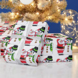 PAPEL DE REGALO MERRY CHRISTMAS AMIGO<br><div class="desc">Esta es una imagen adorable de un amigo ayudando a un amigo,  Santa se ha detenido en su día ocupado para ayudar a su amigo,  el Sr. Snowman. La obra de arte es dibujada a mano artista internacional Jo-Ann N Hayden</div>