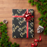 Papel De Regalo Merry Christmas metal gold script negro<br><div class="desc">Feliz Navidad con un elegante y moderno guión con una mirada metálica de oro sobre un elegante fondo negro.</div>