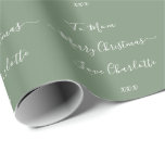 Papel De Regalo Merry Christmas Name To From Sage Green<br><div class="desc">Diseño de envoltura de regalo para Navidades personalizados verdes de sabio. Tiene el mensaje "To Mom Merry Christmas Love Charlotte xxx" en la tipografía de guiones de moda. Para personalizar, simplemente agregue sus nombres en las secciones, a y desde. También tiene la opción de cambiar el mensaje de vacaciones. Para...</div>