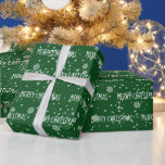 Papel De Regalo MERRY CHRISTMAS Texto En Copos De Nieve<br><div class="desc">Texto de FERIA blanca NAVIDAD con copos de nieve sobre fondo verde. El texto y el color se pueden editar. Se puede cambiar el color de fondo.</div>