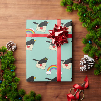 Papel De Regalo Mirlo volando sobre el arcoíris con carta