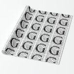 Papel De Regalo Monograma G Patrón floral blanco y negro inicial<br><div class="desc">Monograma G El papel de ajuste inicial del patrón floral blanco y negro se puede personalizar con una imagen, nombre, texto, logotipo o foto. Cambia el fondo blanco a cualquier sombra de azul, verde, amarillo, naranja, rosa, rojo, marrón y morado. Ideal para envolver a Navidades, cumpleaños, ducha de bebé o...</div>