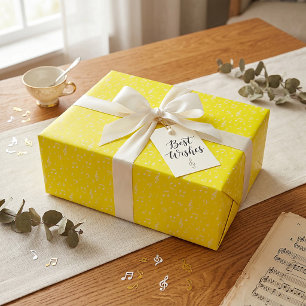 Papel de regalo musical blanco y amarillo