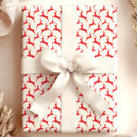 Papel De Regalo Navidades Red Jumping Deer<br><div class="desc">Añada un toque clásico y festivo a sus regalos de vacaciones con este papel de Navidades de ciervos saltos rojos. Con un divertido patrón de siluetas de reno en rojo vivo sobre un fondo blanco, este papel de envoltura es perfecto para cualquier celebración de los Navidades. Ideal para envolver regalos...</div>