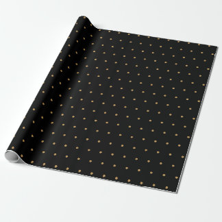 Papel de regalo negro con lunares dorados