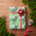 Papel De Regalo Nombre personalizado Dinosaur Merry Christmas Ligh<br><div class="desc">Haz que sus regalos de Navidad sean aún más especiales con este envoltorio personalizado, con un personalizado T-Rex usando un sombrero de Papá Noel y enredado en Navidades, luces en un fondo verde claro. Una burbuja de discursos de los personalizados contiene las palabras "Feliz Navidad" y el nombre de su...</div>