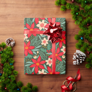 Papel de regalo para Navidad con poinsettia roja.