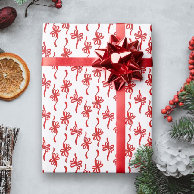 Papel De Regalo Patrón de Navidades de arcos rojos con bucle (white Christmas holiday gift wrapping paper with a pattern of red looping bows)