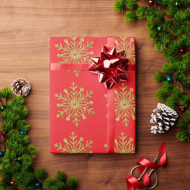 Papel de regalo rojo con copo de nieve dorado (Regalo de vacaciones)