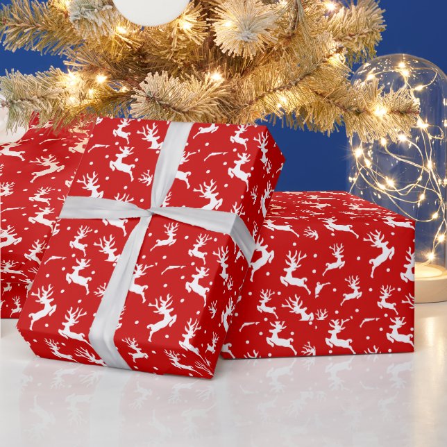 Papel de regalo rojo con renos adorables (Vacaciones)