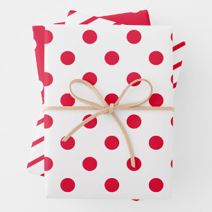Papel de regalo rojo y blanco en hojas