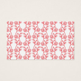 Papel de regalo rojo y rosa con un motivo repetido
