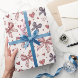 Papel de regalo romántico con lazo y corazón vinta