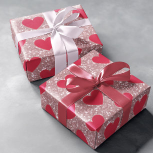 Papel de regalo rosa con purpurina y corazones de