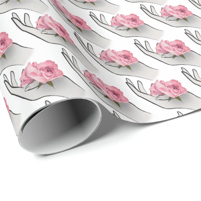 Papel De Regalo rosa rosa rosa en la mano (Esquina del rollo)