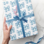 Papel De Regalo Trendy Coquette Baby Blue Bow<br><div class="desc">Papel de envolvimiento de color azul bebé azul azul acuarela. Añada un toque dulce y elegante a sus regalos con este encantador papel de envoltura que presenta un patrón de arco de color azul para bebé. Perfecto para una ducha de bebé o una ducha nupcial con el tema "Algo azul...</div>