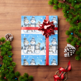 Papel De Regalo Una familia de muñecos de nieve en la nieve