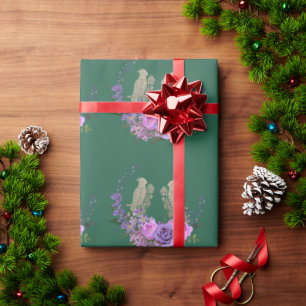 Papel de regalo verde con pájaros y flores