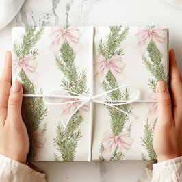 Papel de regalo verde de invierno con lazo rosa
