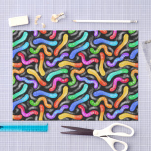 Papel de seda colorido con dulce caramelo de gusan