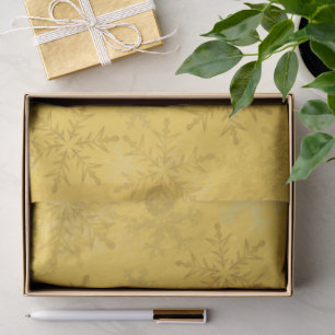 Papel de seda de Navidad con copos de nieve en dor