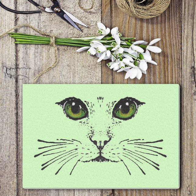 Papel De Seda Misterioso gato enfrenta ojos verdes sacudidores l (Mysterious black cat face green eyes long whiskers on light green wrapping tissue paper sheets.)
