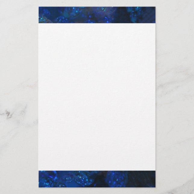 Papelería Burbujas de vidrio azul caída (Anverso)