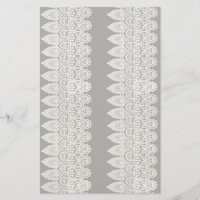 Papelería El encaje blanco forma un delicado borde contra el (Anverso)