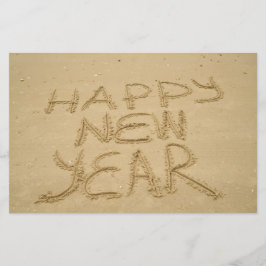 Papelería Feliz Año Nuevo en arena