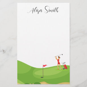 Papelería Golfer Woman está sobre hierba verde en el campo d