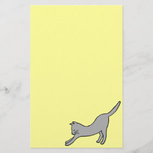 Papelería Gris estirando gato en amarillo