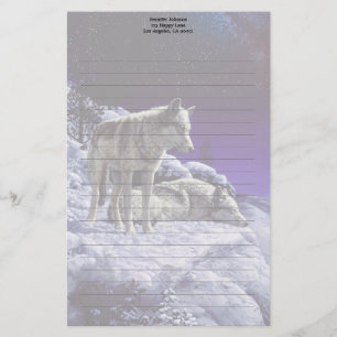Papelería Lobos grises en la nieve de invierno de noche