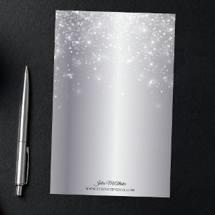 Papelería Luces espumosas sobre elegante metal plateado de M