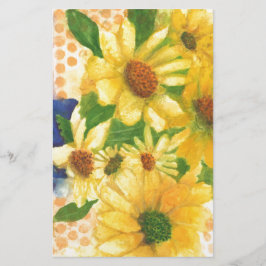 Papelería margaritas amarillas en jarrón azul