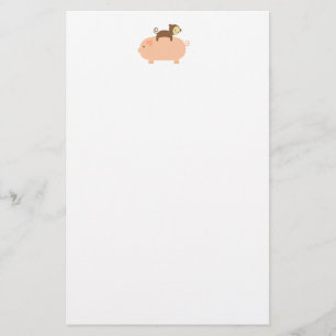 Papelería Mono del bebé que monta al revés en un cerdo