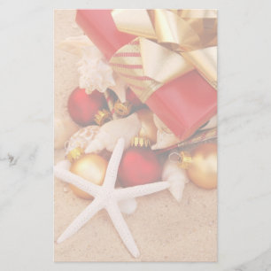 Papelería Navidad en los efectos de escritorio de la playa