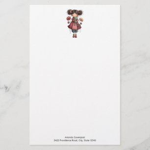 Papelería Niña con muñeca de rana linda y caprichosa