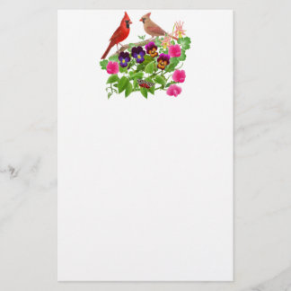Papelería Pájaros cardinales en la estatua del jardín