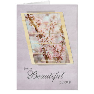 Para una flor de cerezo hermosa de la persona