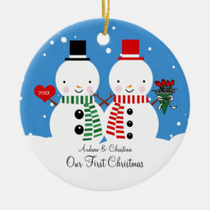 Pares del muñeco de nieve nuestro primer ornamento