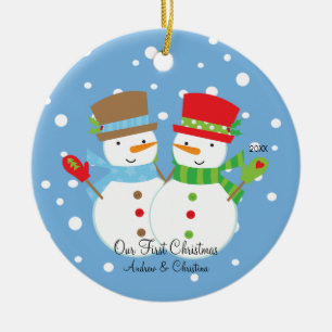 Pares del muñeco de nieve nuestro primer ornamento