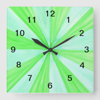 Parques geométricos del reloj de pared verde y azu