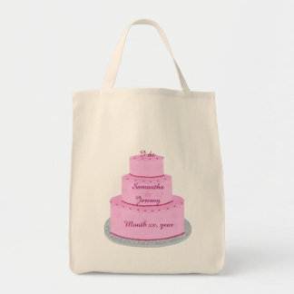 Pastel rosa con bolsas de novia personalizadas en