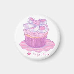 Pastel rosa en el imán de la placa