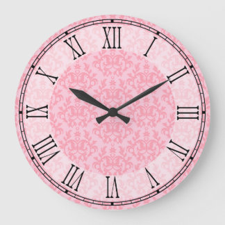 Pata de canguro y reloj de pared rosados del